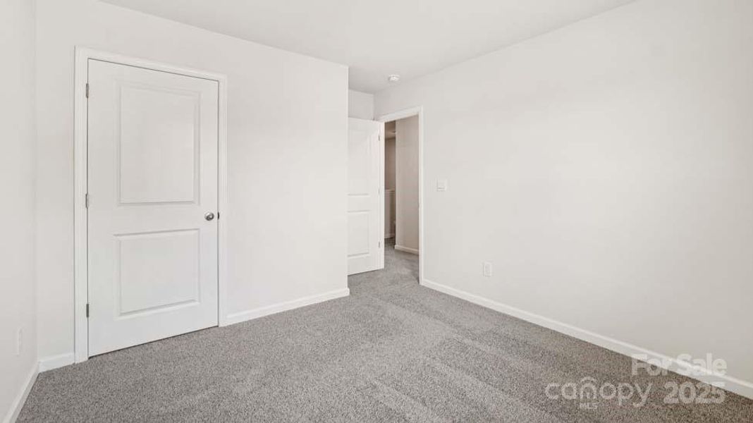 Spacious, unfurnished interior of a new home in Mallard Creek Townhomes, Charlotte (Image 10). Spacious, unfurnished interior of a new home in Mallard Creek Townhomes, Charlotte (Image 10).