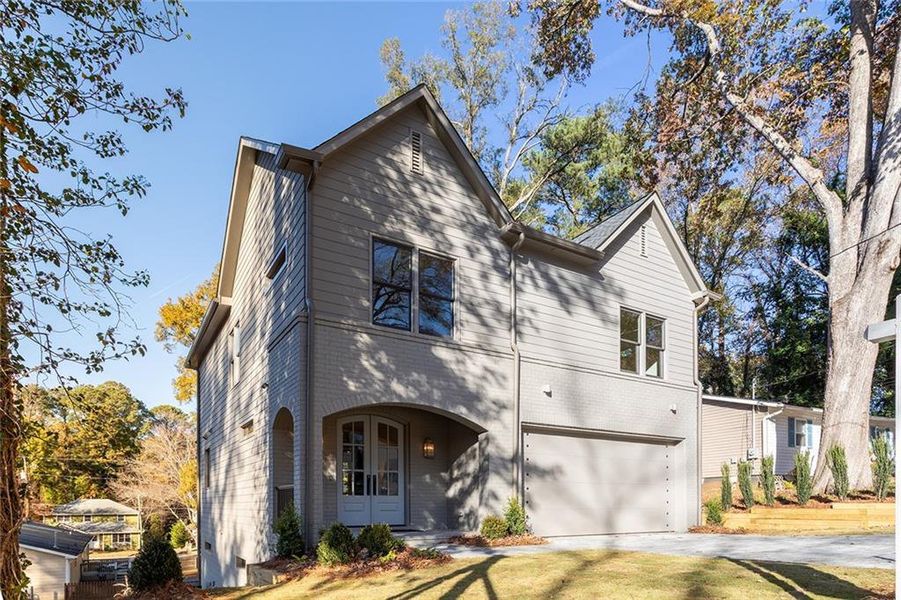 Front exterior of a new home in , Scottdale, GA, highlighting curb appeal (Image 27).