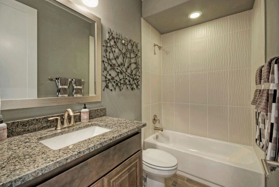 Representative furnished interior of a home built from the Madera II by Giddens Homes in Scofield Farms Estates, Georgetown (Image 162).