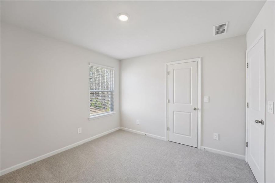 Spacious, unfurnished interior of a new home in Creekside at Oxford Park, Fairburn (Image 36).