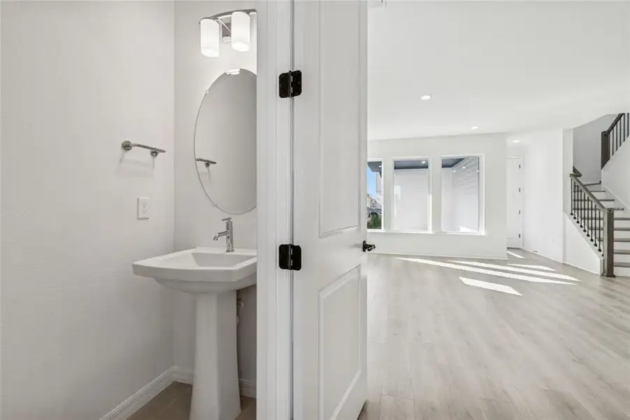 Furnished interior view inside a new home in Weslyn Park in Sunbridge 34', St. Cloud (Image 7).