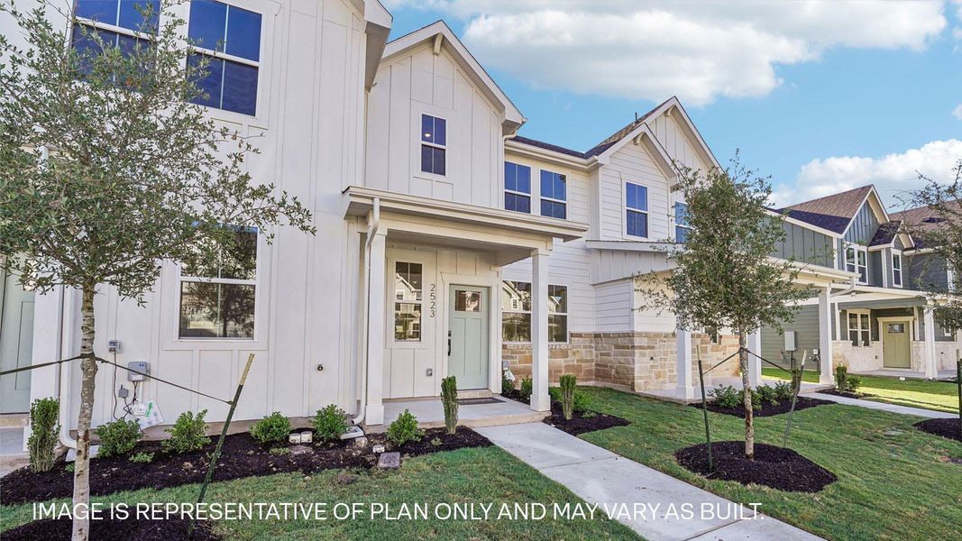 Front exterior of a new home in Avery Centre, Round Rock, TX, highlighting curb appeal (Image 14). Front exterior of a new home in Avery Centre, Round Rock, TX, highlighting curb appeal (Image 14).