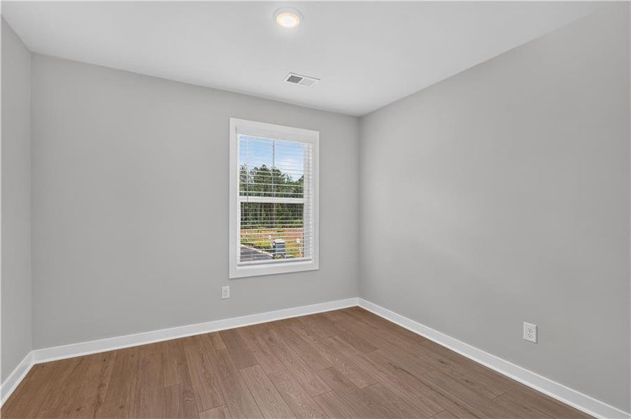 Spacious, unfurnished interior of a new home in The Cottages at East Lanier, Fayetteville (Image 20).