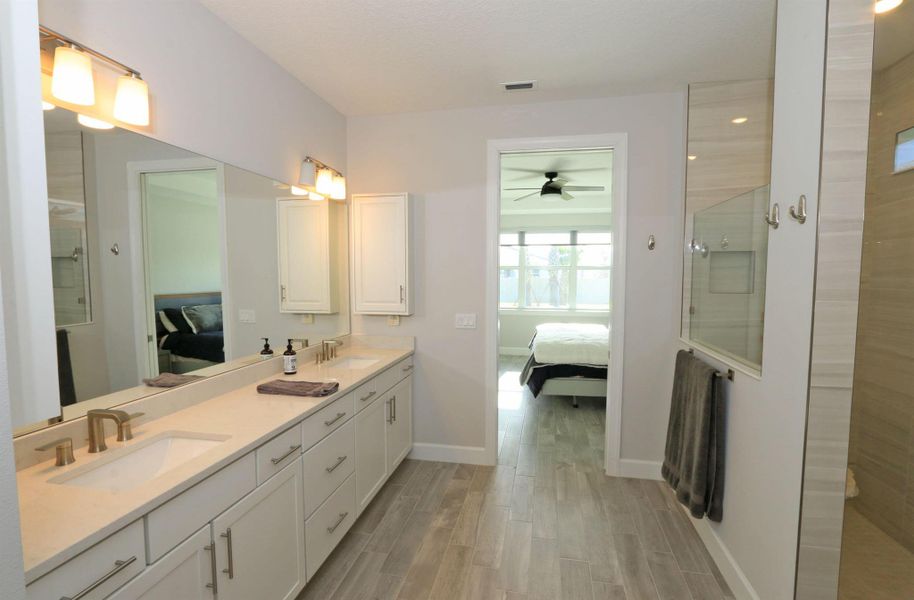Furnished interior view inside a new home in Del Webb Tradition, Port St. Lucie (Image 36).