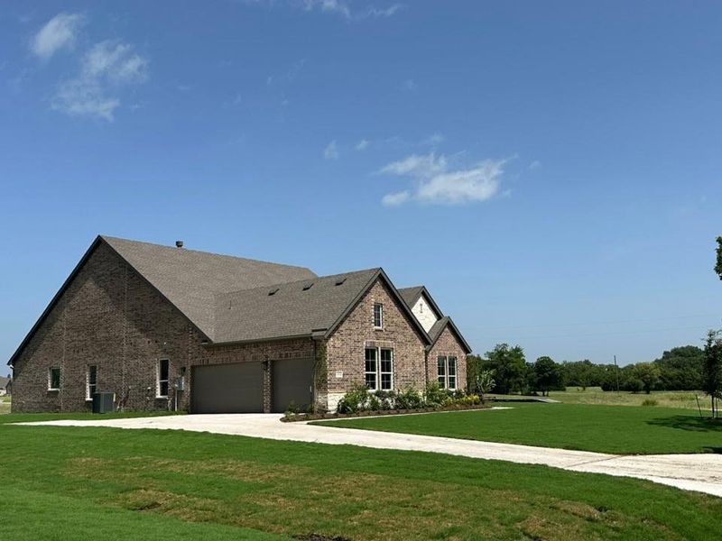 Front exterior of a new home in , Leonard, TX, highlighting curb appeal (Image 18).