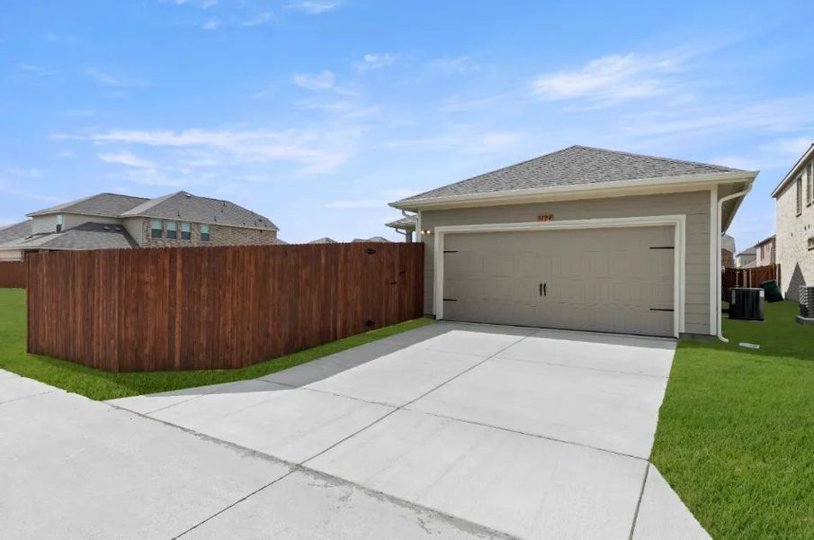 Front exterior of a new home in Heartland, Heartland, TX, highlighting curb appeal (Image 30). Front exterior of a new home in Heartland, Heartland, TX, highlighting curb appeal (Image 30).
