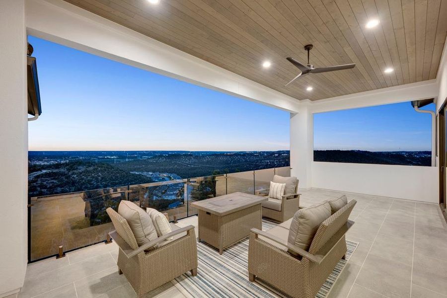 Covered patio with a wood-finish ceiling and recessed lighting Covered patio with a wood-finish ceiling and recessed lighting