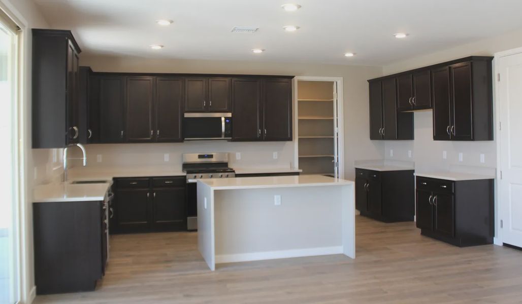 Furnished interior view inside a new home in Las Barrancas, Yuma (Image 5). Furnished interior view inside a new home in Las Barrancas, Yuma (Image 5).