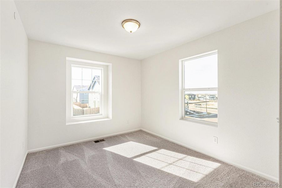 Spacious, unfurnished interior of a new home in Turnberry Villas, Commerce City (Image 22).