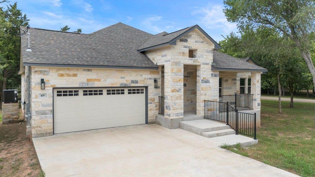 Front exterior of a new home in , Bastrop, TX, highlighting curb appeal (Image 19).