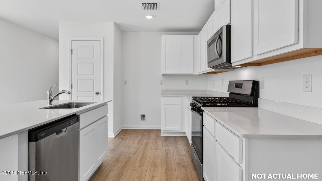 Furnished interior view inside a new home in Copes Landing, Jacksonville (Image 13).