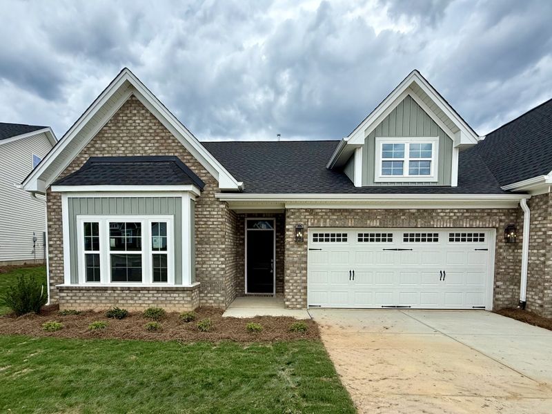 Front exterior of a new home in Fieldstone, Lexington, NC, highlighting curb appeal (Image 1). Front exterior of a new home in Fieldstone, Lexington, NC, highlighting curb appeal (Image 1).
