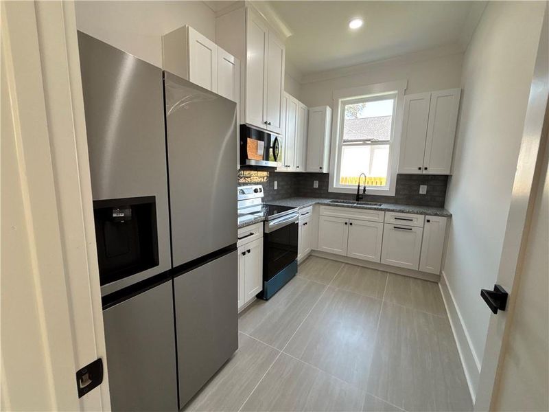 Furnished interior view inside a new home in , Buford (Image 14).