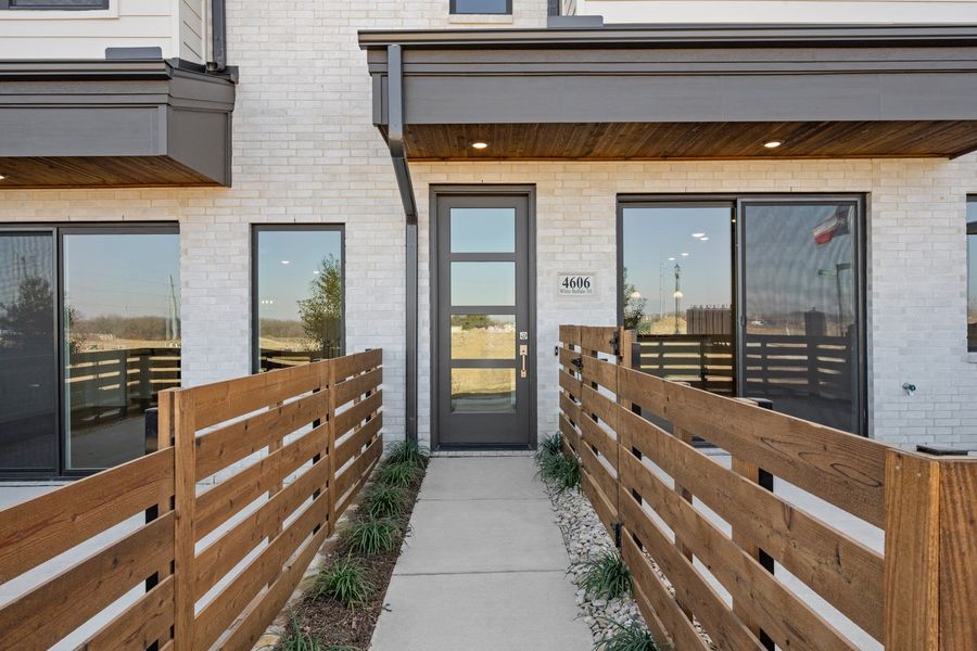 Exterior details and patio area of a home in Wildridge, Oak Point (Image 3).