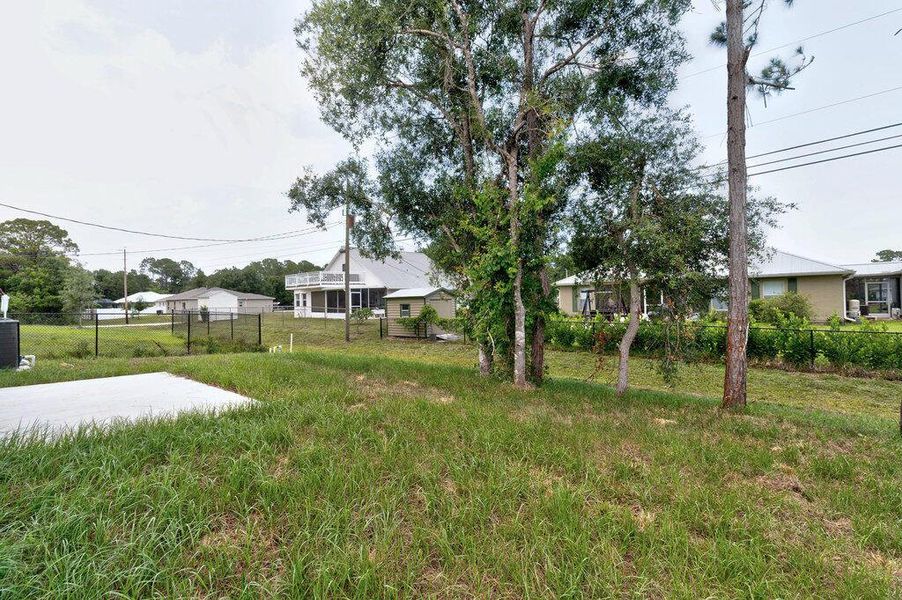 Front exterior of a new home in , Vero Beach, FL, highlighting curb appeal (Image 2). Front exterior of a new home in , Vero Beach, FL, highlighting curb appeal (Image 2).