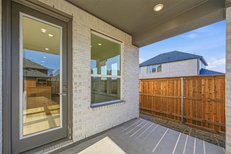Exterior details and patio area of a home in Aster Park, McKinney (Image 2).