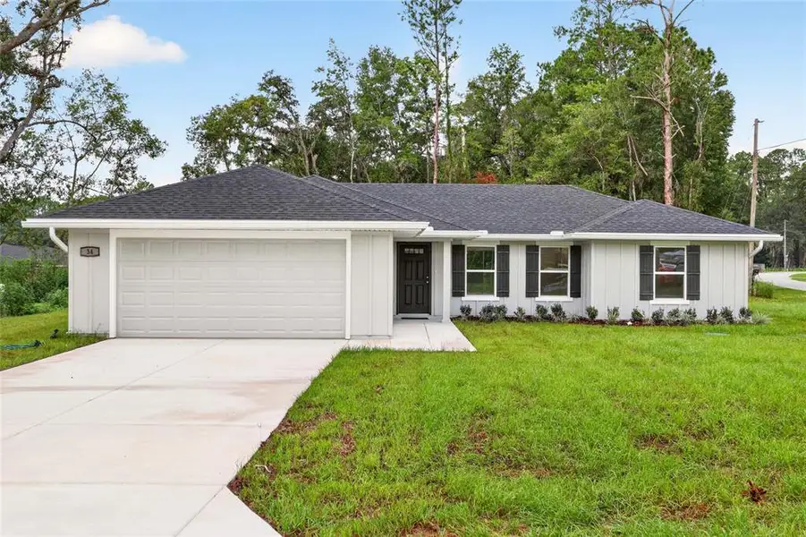 Front exterior of a new home in , Ocala, FL, highlighting curb appeal (Image 20). Front exterior of a new home in , Ocala, FL, highlighting curb appeal (Image 20).