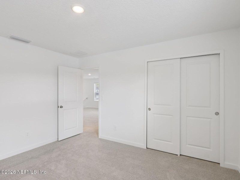 Spacious, unfurnished interior of a new home in Flagler Village - Classic Series, Palm Coast (Image 10). Spacious, unfurnished interior of a new home in Flagler Village - Classic Series, Palm Coast (Image 10).