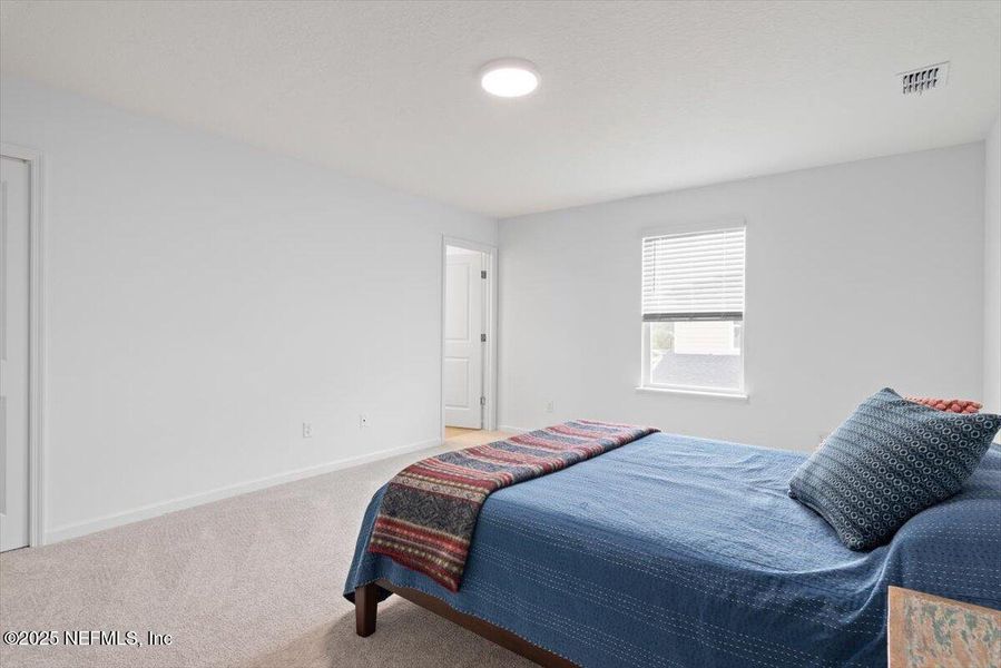 Furnished interior view inside a new home in Hardwick Farms: Hardwick Farms - Townhome Collection, Jacksonville (Image 36).