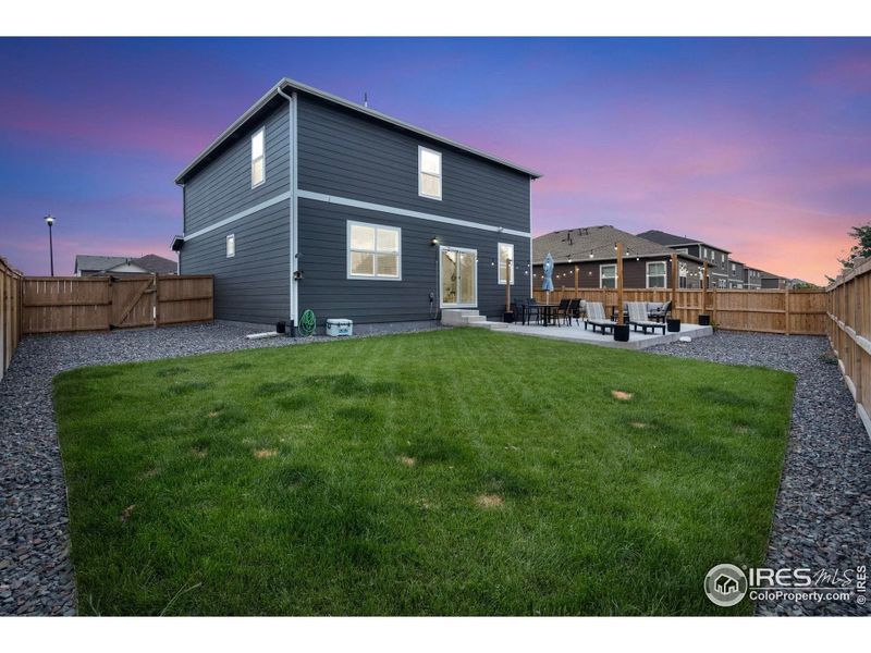 Private backyard is the perfect blend of xeriscape and grass. Private backyard is the perfect blend of xeriscape and grass.