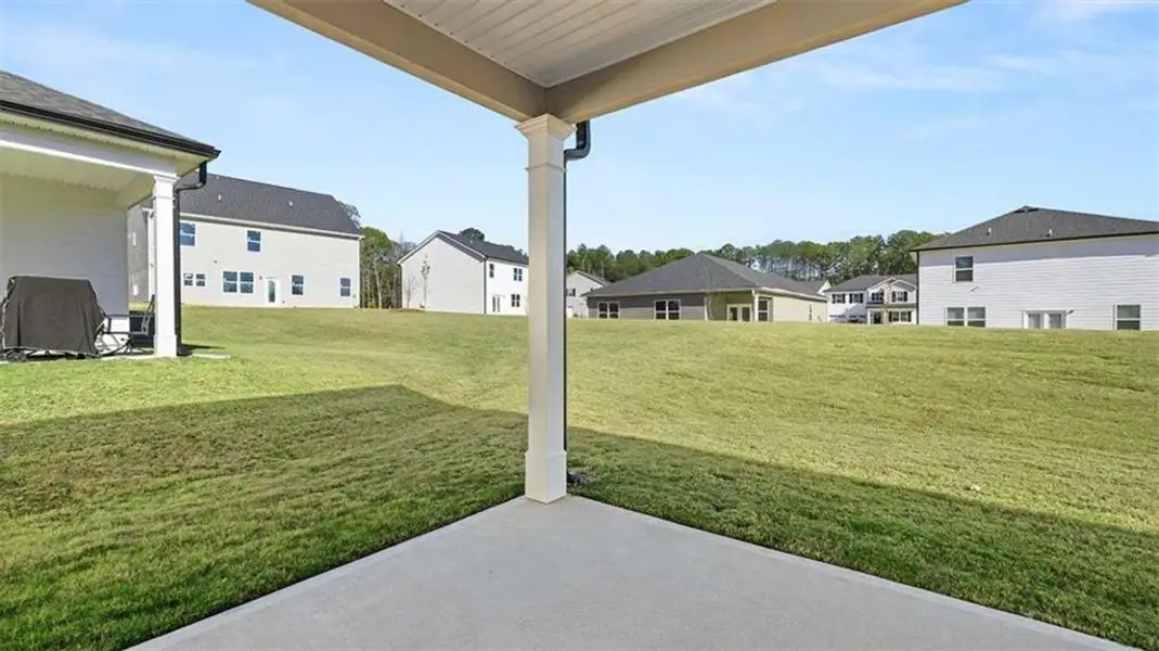Exterior details and patio area of a home in Oakchase at Hampton, Hampton (Image 3). Exterior details and patio area of a home in Oakchase at Hampton, Hampton (Image 3).