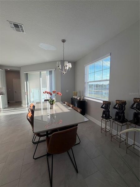Furnished interior view inside a new home in Center Lake on the Park, St. Cloud (Image 11).