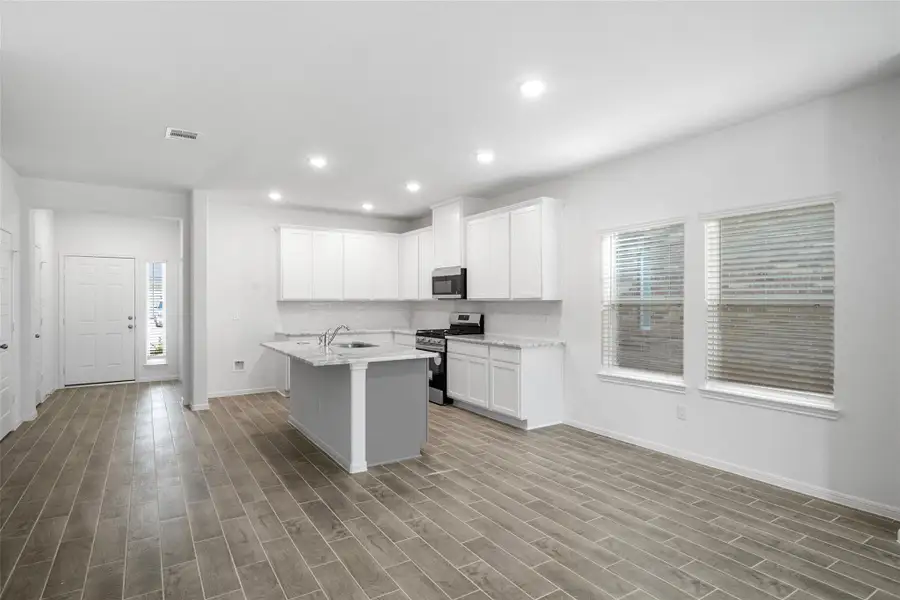 Furnished interior view inside a new home in Rollingbrook Estates, Baytown (Image 9).