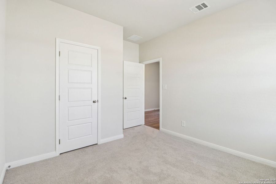 Spacious, unfurnished interior of a new home in Legendary Trails - Classic Series, Cibolo (Image 33).