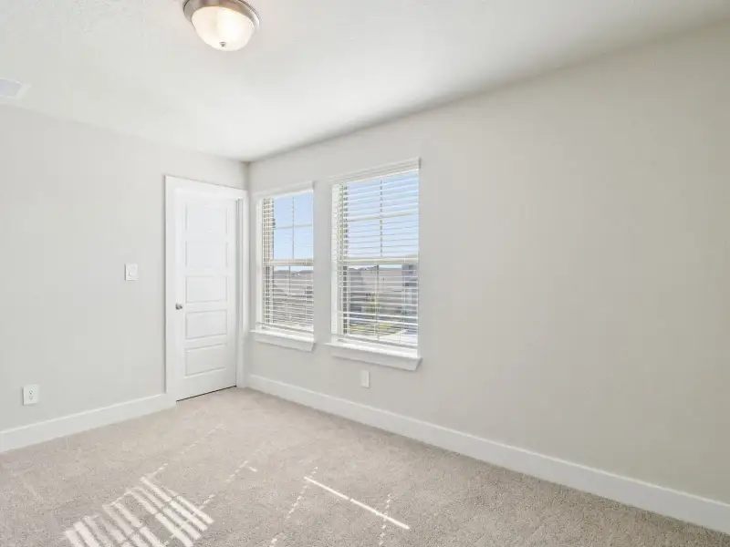 Spacious, unfurnished interior of a new home in Legendary Trails - Premier Series, Cibolo (Image 26).