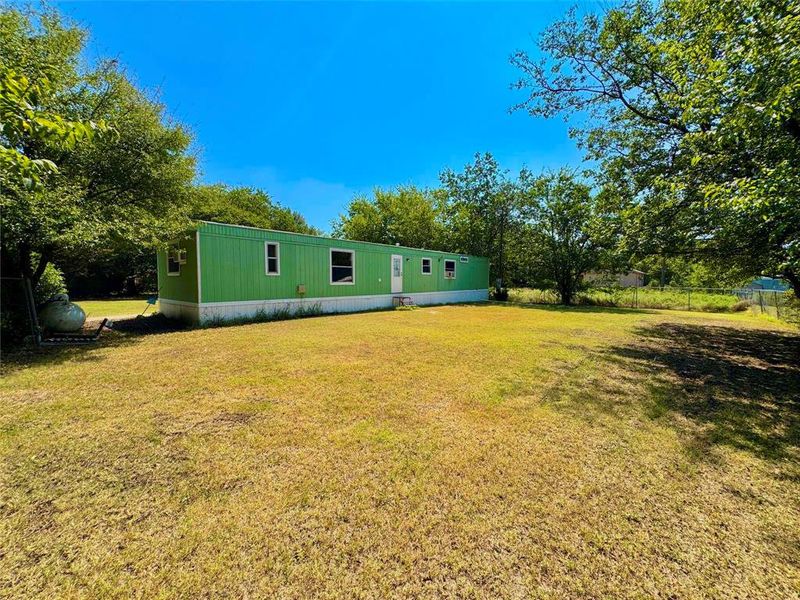 Exterior details and patio area of a home in , Azle (Image 15).