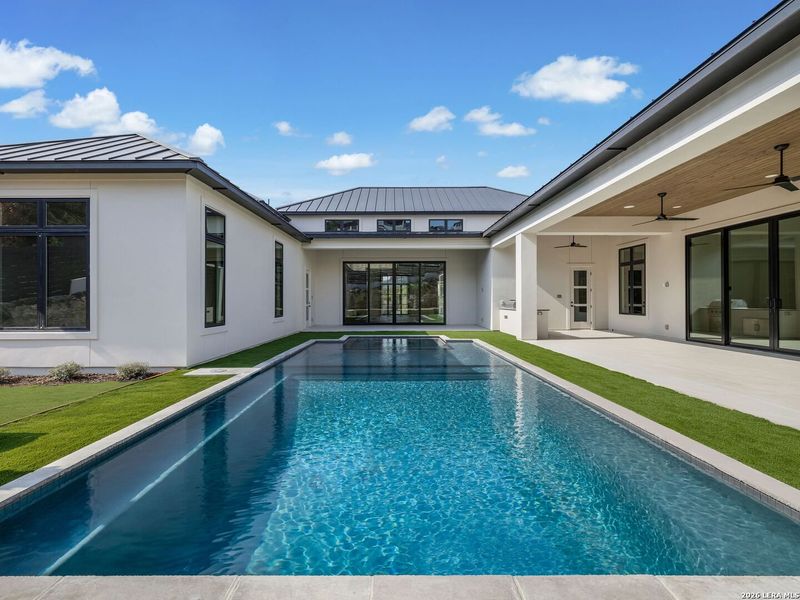 Exterior details and patio area of a home in , San Antonio (Image 38).