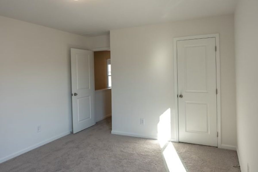 Representative unfurnished interior of a home built from the Laurel by Piedmont Residential in Meadowyn, Cartersville (Image 26).