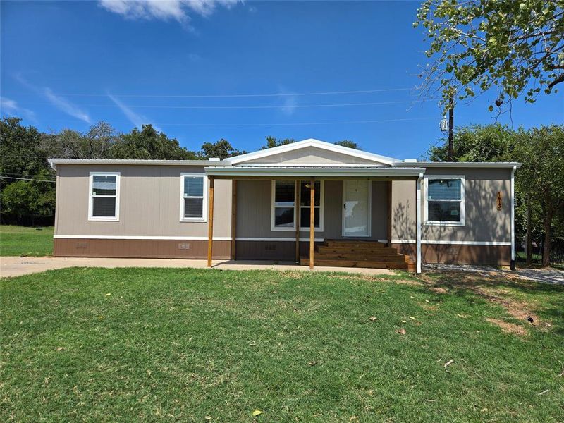 Exterior details and patio area of a home in , Pelican Bay (Image 15).