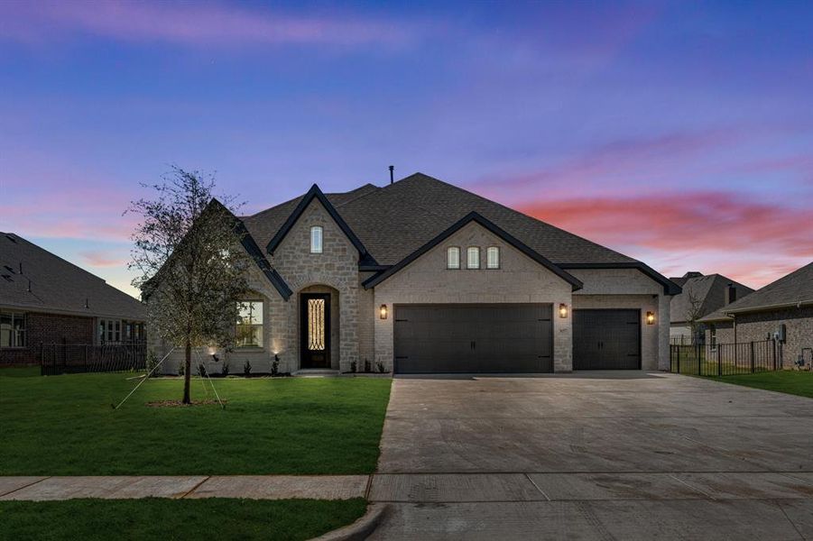 Front exterior of a new home in Abe's Landing, Granbury, TX, highlighting curb appeal (Image 1).