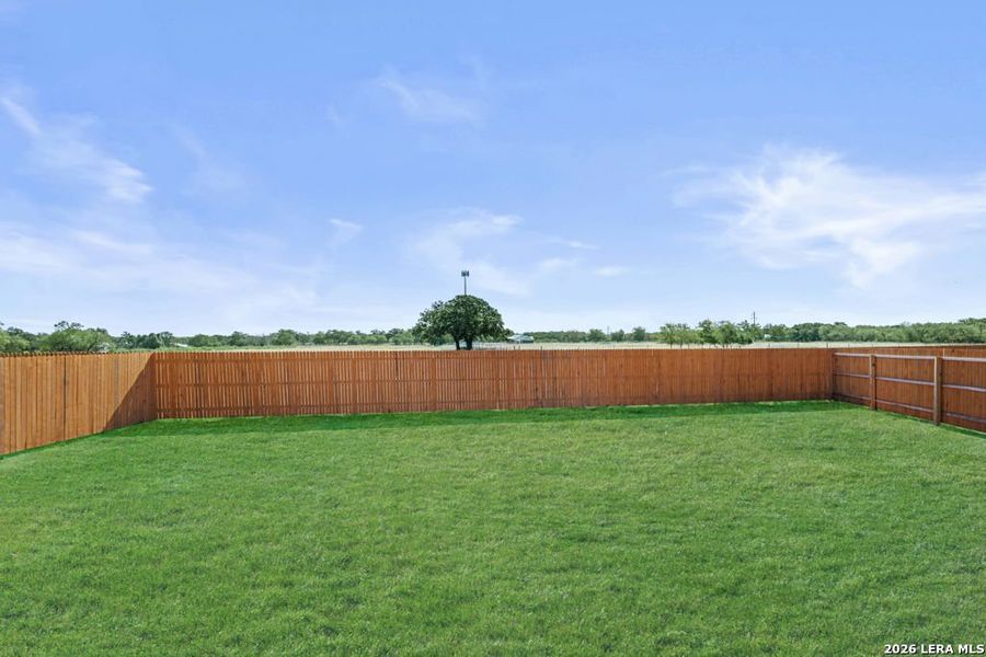 Exterior details and patio area of a home in Friendship Oaks, Fredericksburg (Image 16).