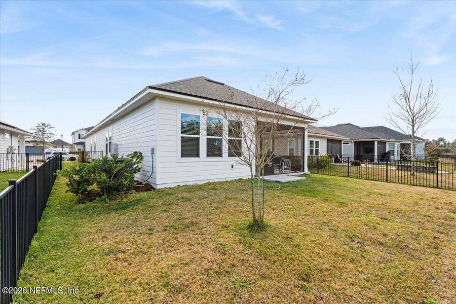 Exterior details and patio area of a home in SilverLeaf Village, St. Augustine (Image 3).