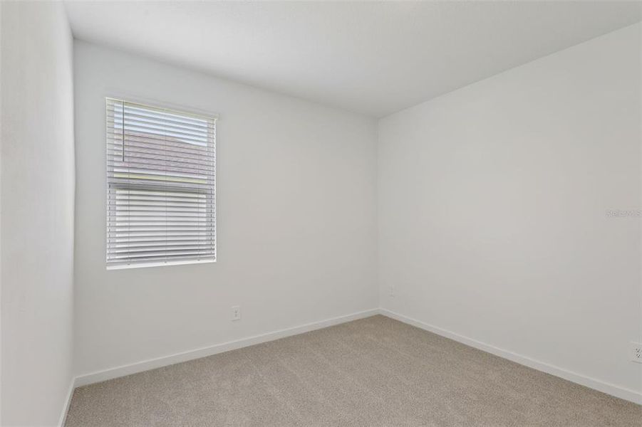 Spacious, unfurnished interior of a new home in Colbert Landings, Palm Coast (Image 30).
