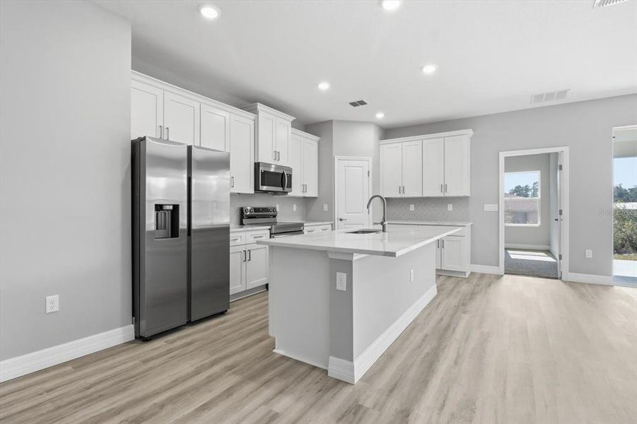 Furnished interior view inside a new home in , Ocala (Image 8).