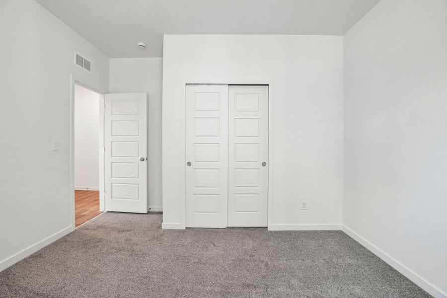 Spacious, unfurnished interior of a new home in Union Colony West, Greeley (Image 40).