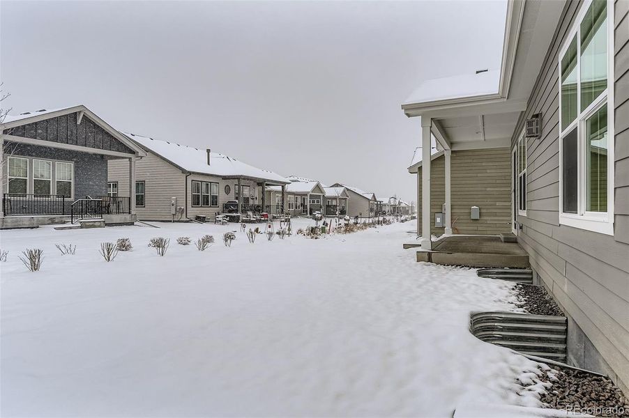 Exterior details and patio area of a home in Hilltop 55+ at Inspiration, Aurora (Image 19). Exterior details and patio area of a home in Hilltop 55+ at Inspiration, Aurora (Image 19).