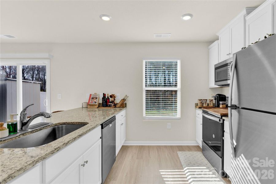 Furnished interior view inside a new home in , Charlotte (Image 5).
