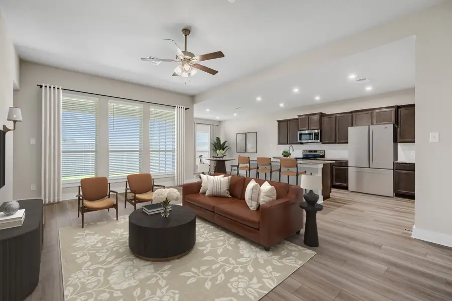 Representative furnished interior of a home built from the Newport by Omega Builders in Southern Pointe, College Station (Image 4).