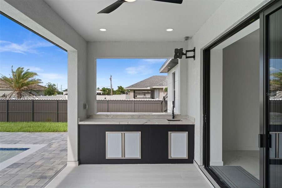 Exterior details and patio area of a home in , Cape Coral (Image 24). Exterior details and patio area of a home in , Cape Coral (Image 24).