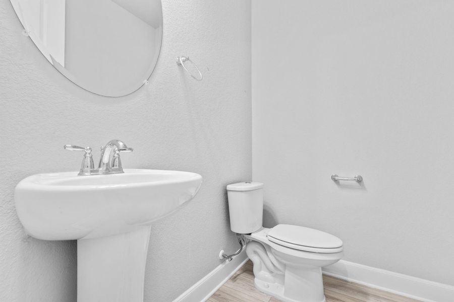 Downstairs half bath/powder room Downstairs half bath/powder room