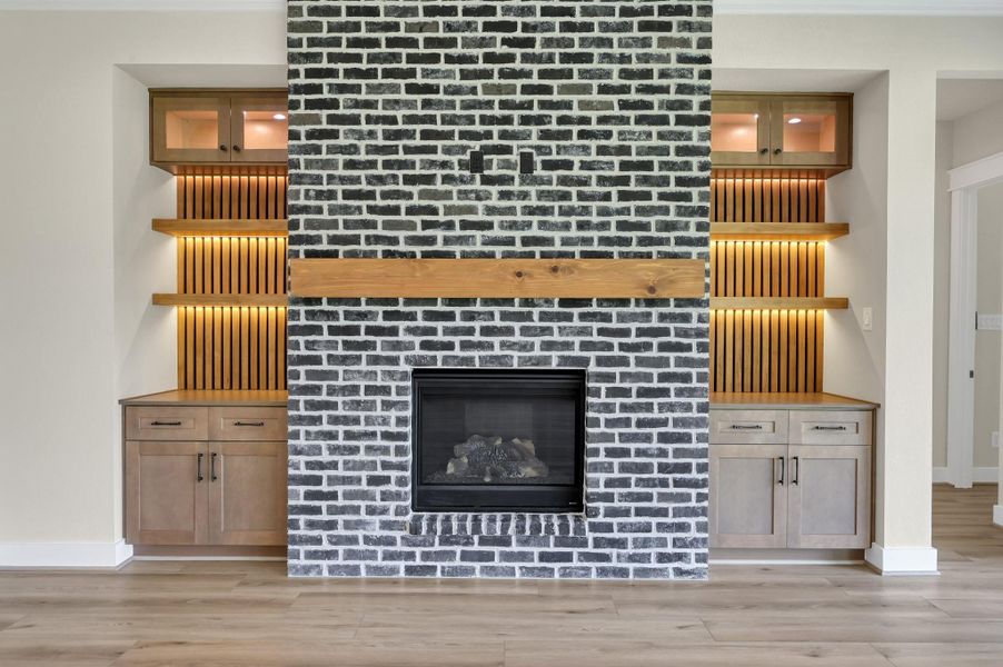Gorgeous Fireplace and floating shelves with lighting Gorgeous Fireplace and floating shelves with lighting