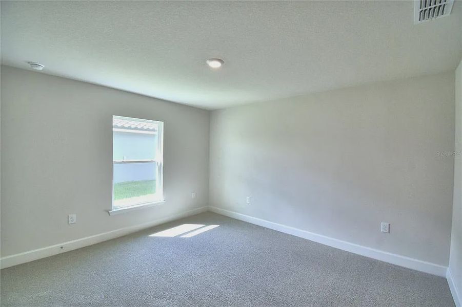 Spacious, unfurnished interior of a new home in Lake Juliana Estates, Auburndale (Image 22).