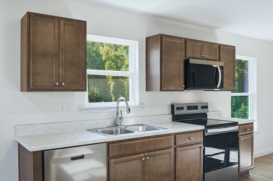 Furnished interior view inside a new home in Stones Throw, Inman (Image 6).