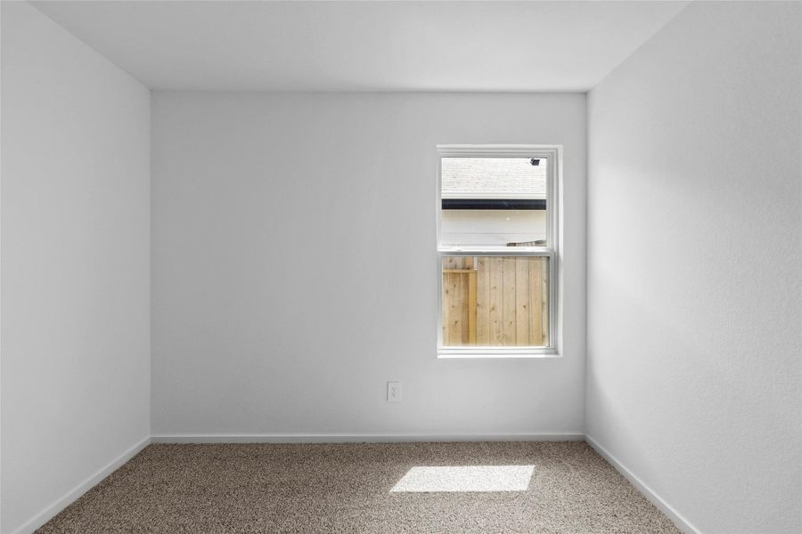 Spacious, unfurnished interior of a new home in The Canopies, Splendora (Image 22).