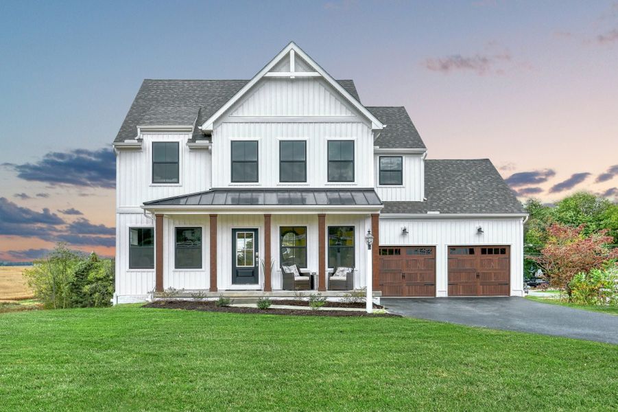 Representative exterior photo of a completed home built from the Addison by Keystone Custom Homes in Mayes Hall, Davidson, NC (Image 11).