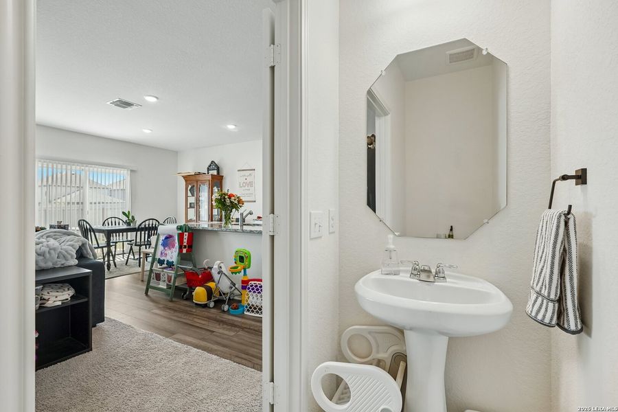Furnished interior view inside a new home in Hennersby Hollow, San Antonio (Image 10).